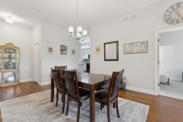 4107 Meander Pl Unit 104, Rockledge, FL 32955 - dining space featuring a chandelier and hardwood / wood-style floors