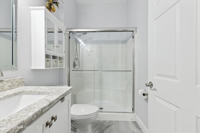 4107 Meander Pl Unit 104, Rockledge, FL 32955 - full bathroom with vanity, marble finish flooring, and a stall shower