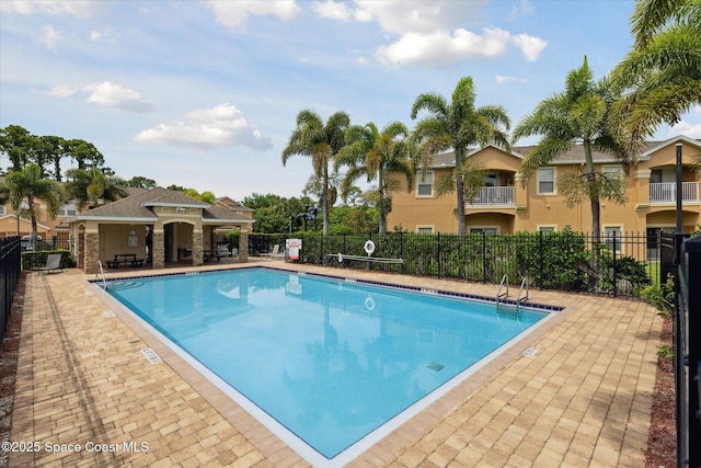 4107 Meander Pl Unit 104, Rockledge, FL 32955 - community pool featuring a patio