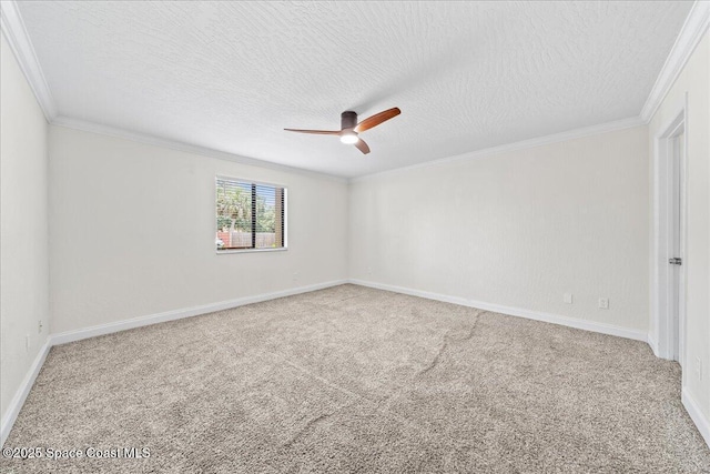 2190 Forest Knoll Dr NE Unit 90-104, Palm Bay, FL 32905 - spare room with ceiling fan, crown molding, carpet, and a textured ceiling