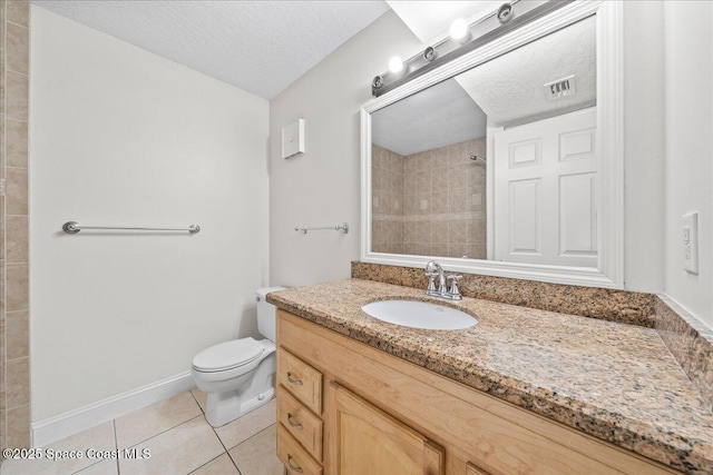 2190 Forest Knoll Dr NE Unit 90-104, Palm Bay, FL 32905 - full bath featuring a textured ceiling, vanity, tile patterned floors, and tiled shower