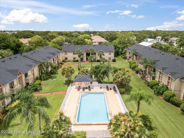 2190 Forest Knoll Dr NE Unit 90-104, Palm Bay, FL 32905 - aerial perspective of suburban area with a pool area