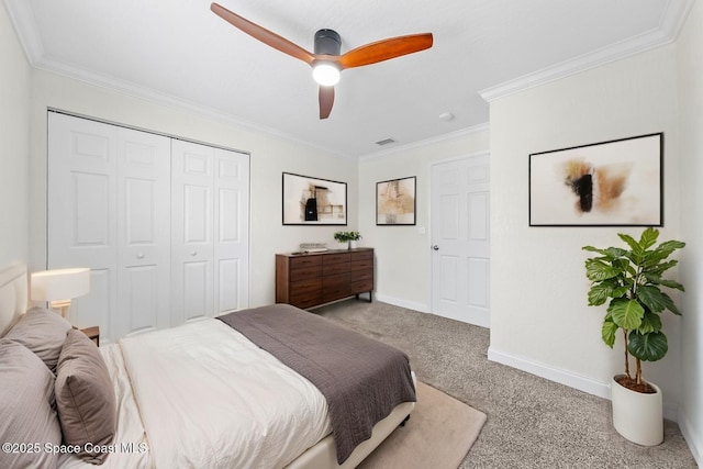 2190 Forest Knoll Dr NE Unit 90-104, Palm Bay, FL 32905 - carpeted bedroom with ornamental molding, a closet, and a ceiling fan
