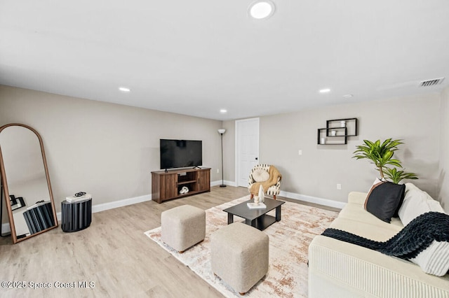 532 Buckingham Ave, Melbourne, FL 32935 - living area featuring wood finished floors and recessed lighting