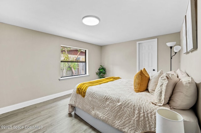 532 Buckingham Ave, Melbourne, FL 32935 - bedroom with wood finished floors and baseboards