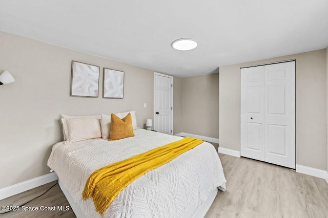 532 Buckingham Ave, Melbourne, FL 32935 - bedroom featuring light wood-type flooring and a closet