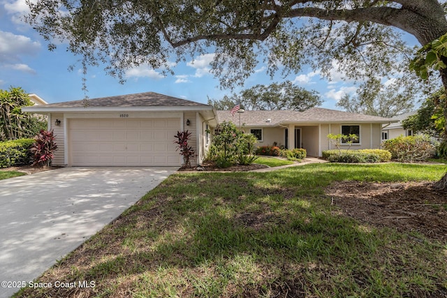 1570 Frontier Dr, Melbourne, FL 32940 - ranch-style house featuring driveway, an attached garage, and a front lawn
