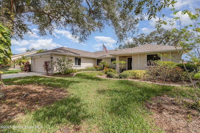 1570 Frontier Dr, Melbourne, FL 32940 - single story home featuring a garage, driveway, a front yard, and stucco siding