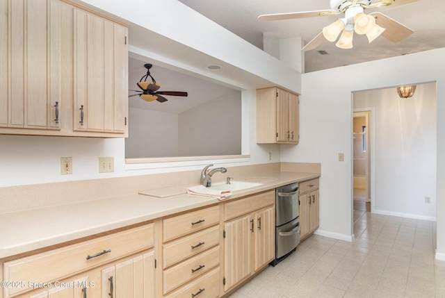 1570 Frontier Dr, Melbourne, FL 32940 - kitchen with a ceiling fan, light brown cabinetry, dishwasher, light countertops, and light tile patterned floors
