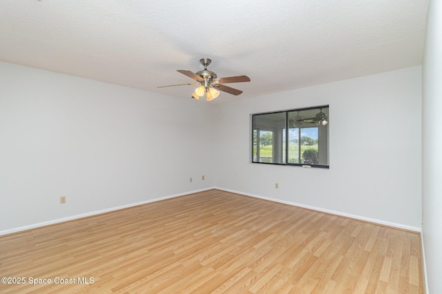 1570 Frontier Dr, Melbourne, FL 32940 - empty room featuring light wood-style flooring and a ceiling fan