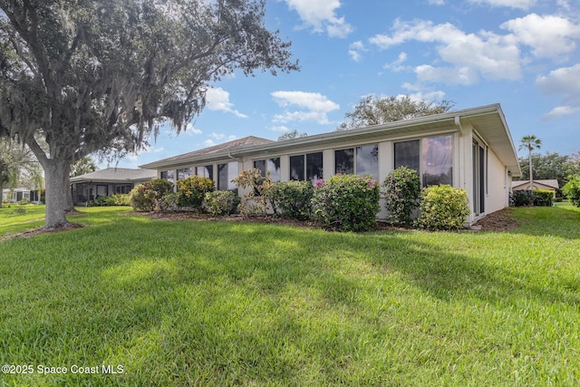 1570 Frontier Dr, Melbourne, FL 32940 - single story home featuring a front yard and stucco siding
