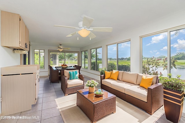 1570 Frontier Dr, Melbourne, FL 32940 - sunroom / solarium featuring plenty of natural light, a water view, and tile patterned flooring