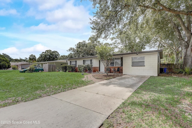 1032 Bernice Rd, Rockledge, FL 32955 - ranch-style home with driveway and concrete block siding