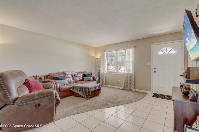 1032 Bernice Rd, Rockledge, FL 32955 - living room with light colored carpet, light tile patterned floors, and a textured ceiling