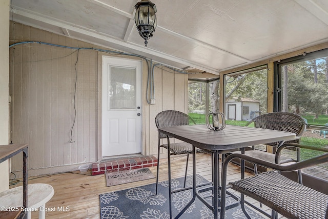 1032 Bernice Rd, Rockledge, FL 32955 - sunroom / solarium featuring outdoor dining space and vaulted ceiling