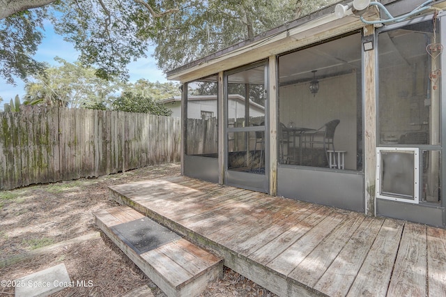 1032 Bernice Rd, Rockledge, FL 32955 - wooden deck featuring a sunroom