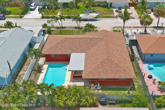 765 Palm Dr, Satellite Beach, FL 32937 - aerial perspective of suburban area featuring a pool area