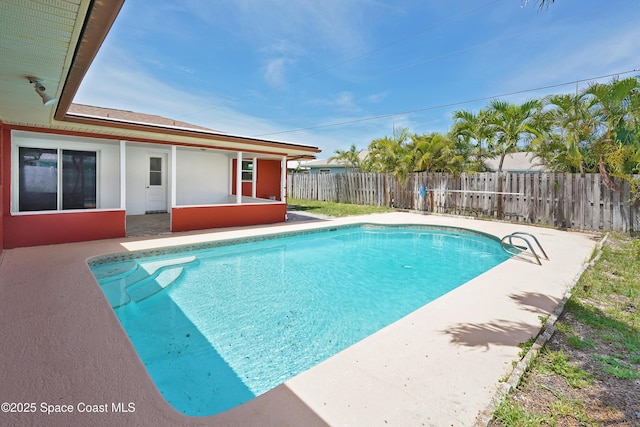 765 Palm Dr, Satellite Beach, FL 32937 - view of swimming pool with a patio area