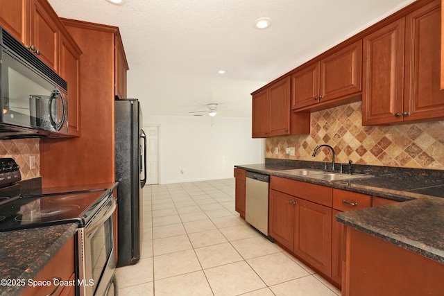 765 Palm Dr, Satellite Beach, FL 32937 - kitchen featuring black appliances, a ceiling fan, tasteful backsplash, light tile patterned floors, and recessed lighting