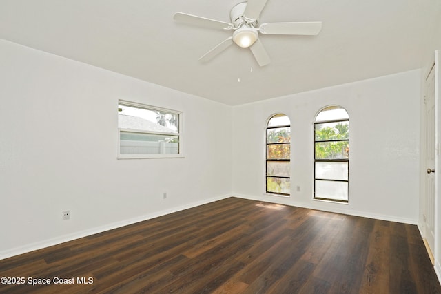 765 Palm Dr, Satellite Beach, FL 32937 - unfurnished room with wood finished floors and a ceiling fan