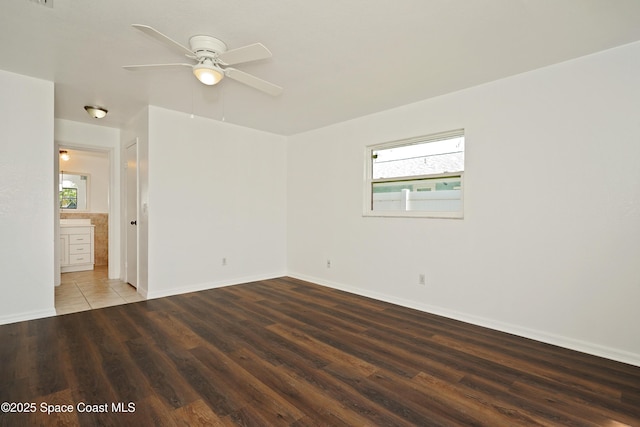 765 Palm Dr, Satellite Beach, FL 32937 - spare room featuring plenty of natural light, ceiling fan, and wood finished floors