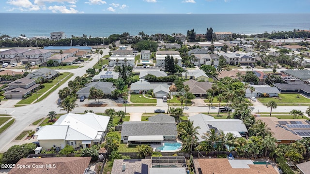 658 Hibiscus Dr, Satellite Beach, FL 32937 - aerial view of residential area featuring a large body of water