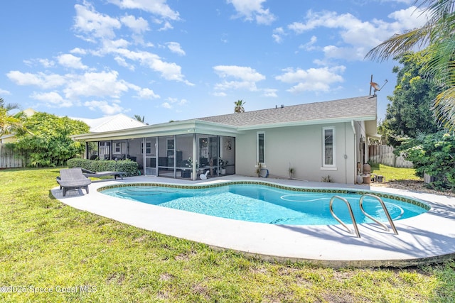 658 Hibiscus Dr, Satellite Beach, FL 32937 - view of swimming pool with a sunroom and a patio