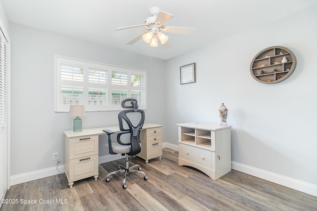 658 Hibiscus Dr, Satellite Beach, FL 32937 - office area with light wood-style floors and ceiling fan