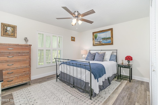 658 Hibiscus Dr, Satellite Beach, FL 32937 - bedroom with light wood finished floors and a ceiling fan