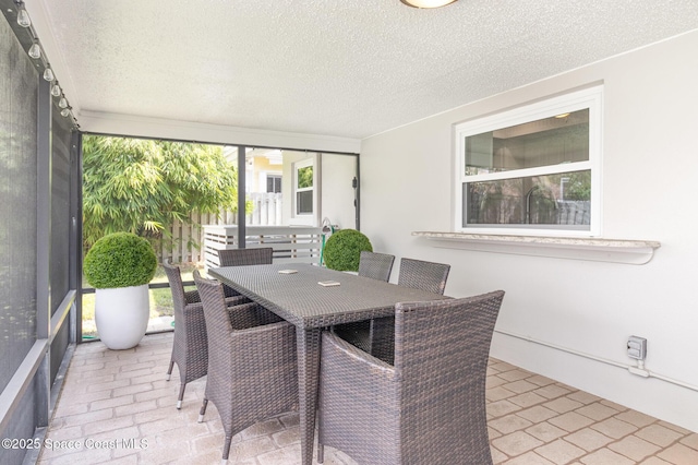 658 Hibiscus Dr, Satellite Beach, FL 32937 - sunroom / solarium with outdoor dining area