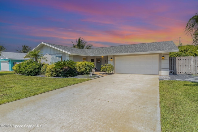 658 Hibiscus Dr, Satellite Beach, FL 32937 - ranch-style home featuring concrete driveway, a garage, roof with shingles, and stucco siding