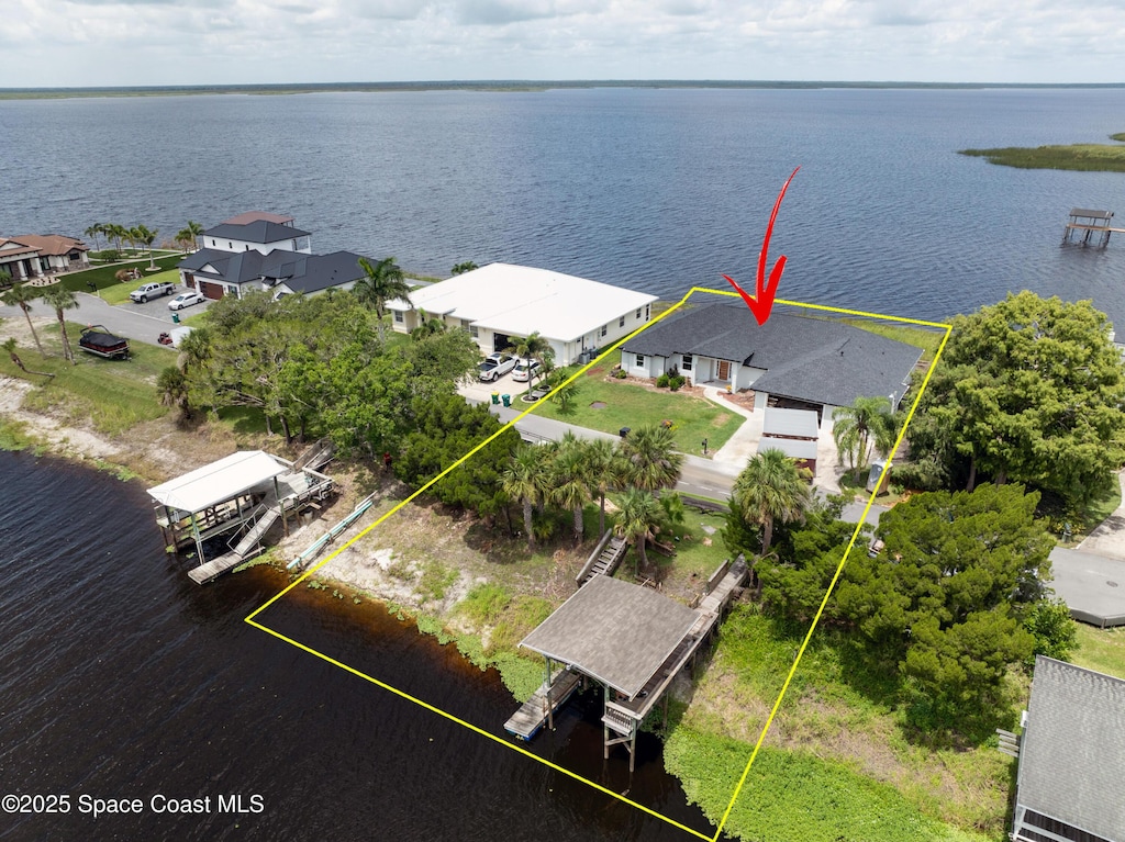 855 Cliftons Cove Ct, Cocoa, FL 32926 - aerial view of property and surrounding area featuring a nearby body of water and property parcel outlined