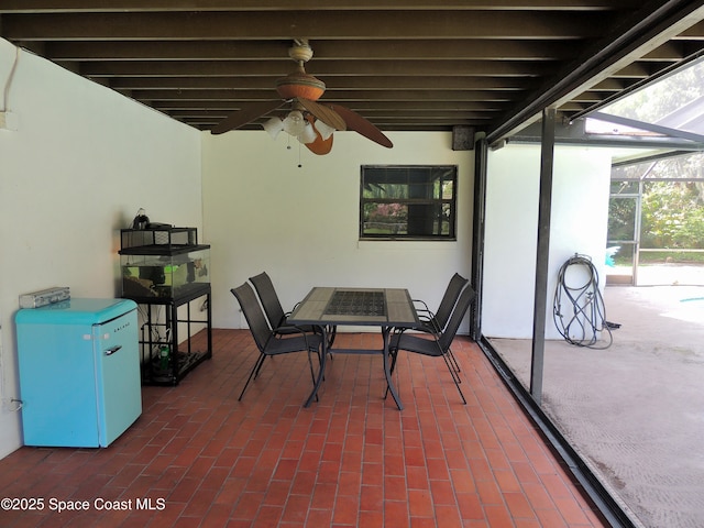 1368 Gleneagles Way, Rockledge, FL 32955 - view of patio / terrace featuring outdoor dining area, ceiling fan, and glass enclosure