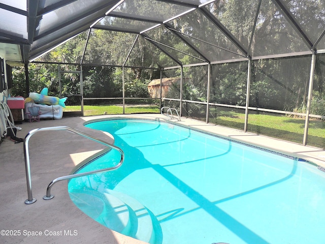 1368 Gleneagles Way, Rockledge, FL 32955 - swimming pool featuring glass enclosure, a patio area, and a yard