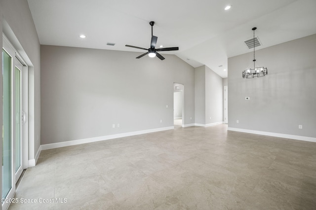 1107 Conquistador Dr, Rockledge, FL 32955 - unfurnished living room featuring a ceiling fan, a chandelier, lofted ceiling, and recessed lighting