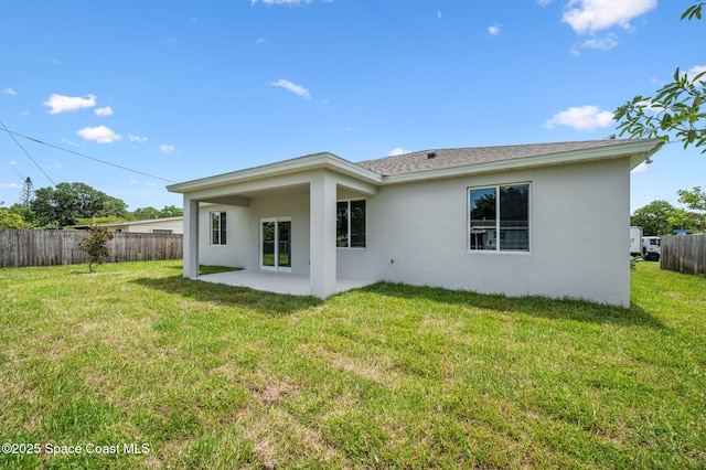 1107 Conquistador Dr, Rockledge, FL 32955 - rear view of property featuring stucco siding and a patio