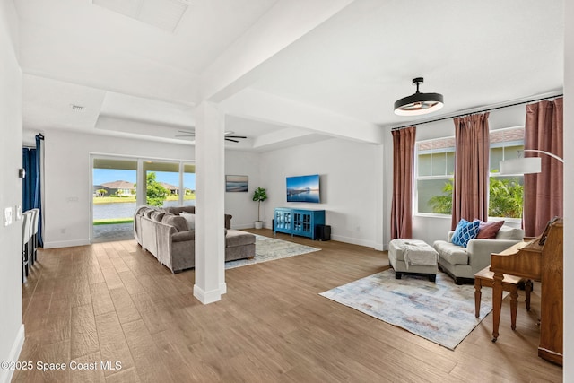 9374 Corvo Ct, Melbourne, FL 32940 - living room featuring wood finished floors and ceiling fan