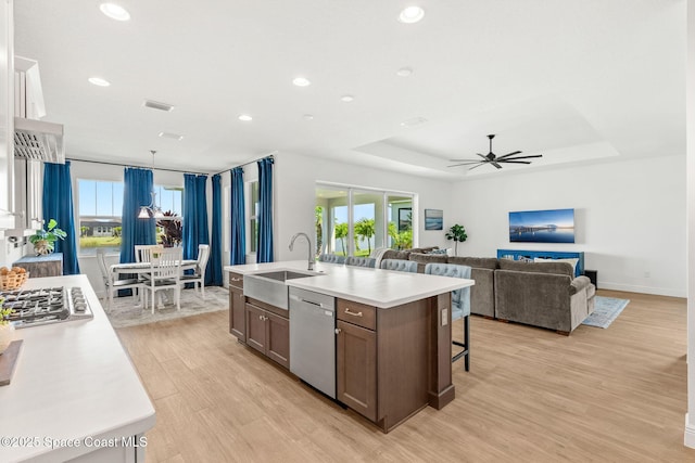 9374 Corvo Ct, Melbourne, FL 32940 - kitchen with stainless steel appliances, a ceiling fan, light countertops, healthy amount of natural light, and recessed lighting
