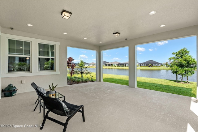9374 Corvo Ct, Melbourne, FL 32940 - view of patio featuring a water view and a residential view