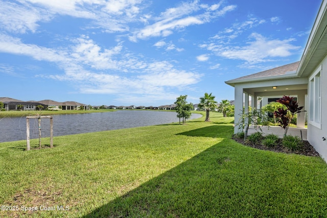9374 Corvo Ct, Melbourne, FL 32940 - view of grassy yard with a water view and a residential view