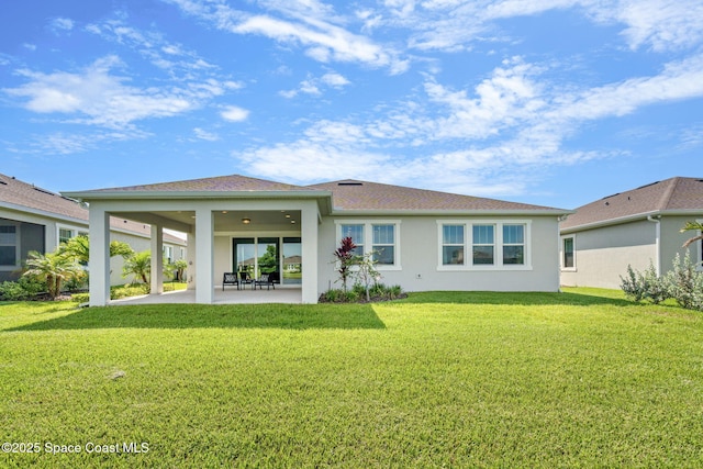 9374 Corvo Ct, Melbourne, FL 32940 - back of house featuring a patio, stucco siding, a yard, and a ceiling fan