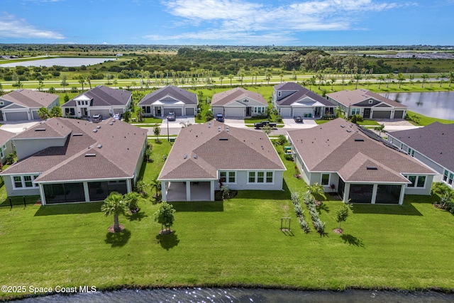 9374 Corvo Ct, Melbourne, FL 32940 - aerial view of residential area with a large body of water