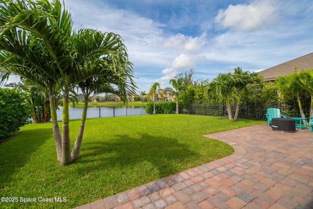 739 Fiddleleaf Cir, Melbourne, FL 32904 - view of yard with a patio area and a water view