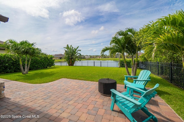 739 Fiddleleaf Cir, Melbourne, FL 32904 - fenced backyard featuring a water view and a patio