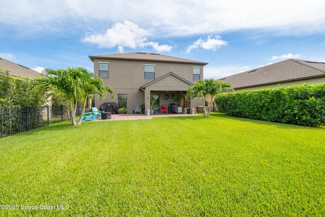 739 Fiddleleaf Cir, Melbourne, FL 32904 - rear view of house featuring stucco siding and a patio