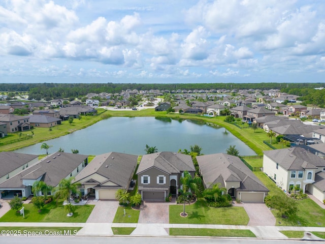 739 Fiddleleaf Cir, Melbourne, FL 32904 - aerial view of residential area featuring a large body of water