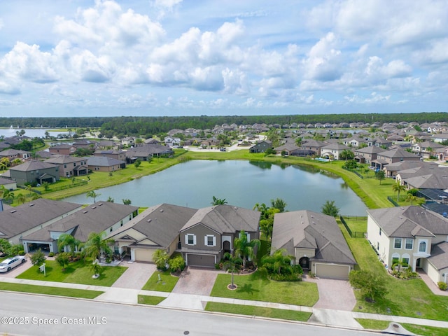 739 Fiddleleaf Cir, Melbourne, FL 32904 - aerial perspective of suburban area with a large body of water
