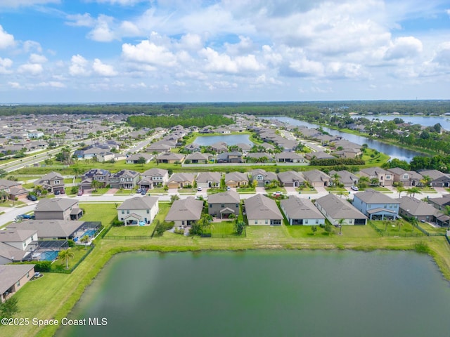 739 Fiddleleaf Cir, Melbourne, FL 32904 - aerial view of residential area featuring a nearby body of water