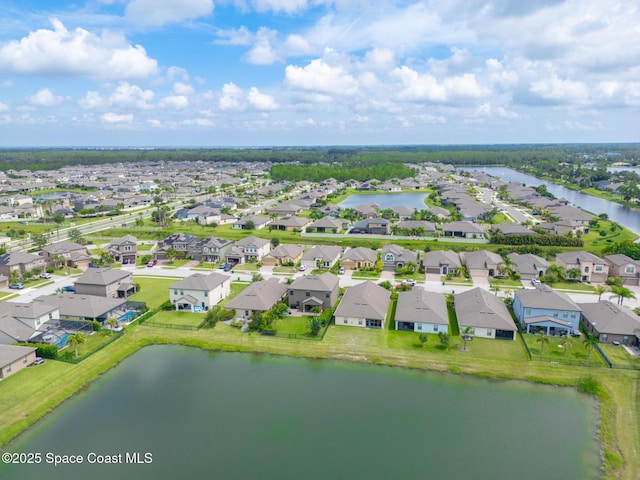 739 Fiddleleaf Cir, Melbourne, FL 32904 - aerial view of residential area featuring a large body of water