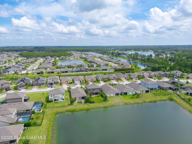 739 Fiddleleaf Cir, Melbourne, FL 32904 - aerial perspective of suburban area with a nearby body of water